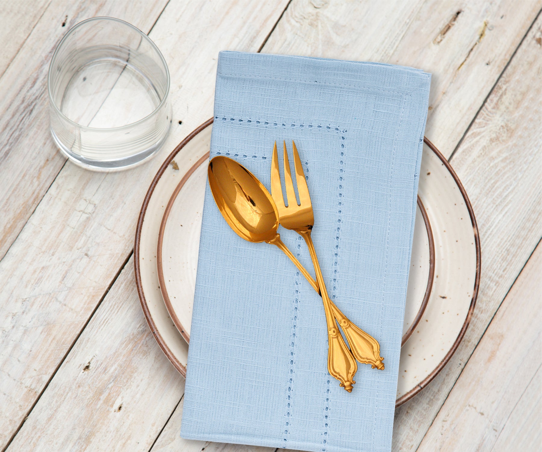 "Set of blue linen napkins, adding a subtle pop of color to your table setting.