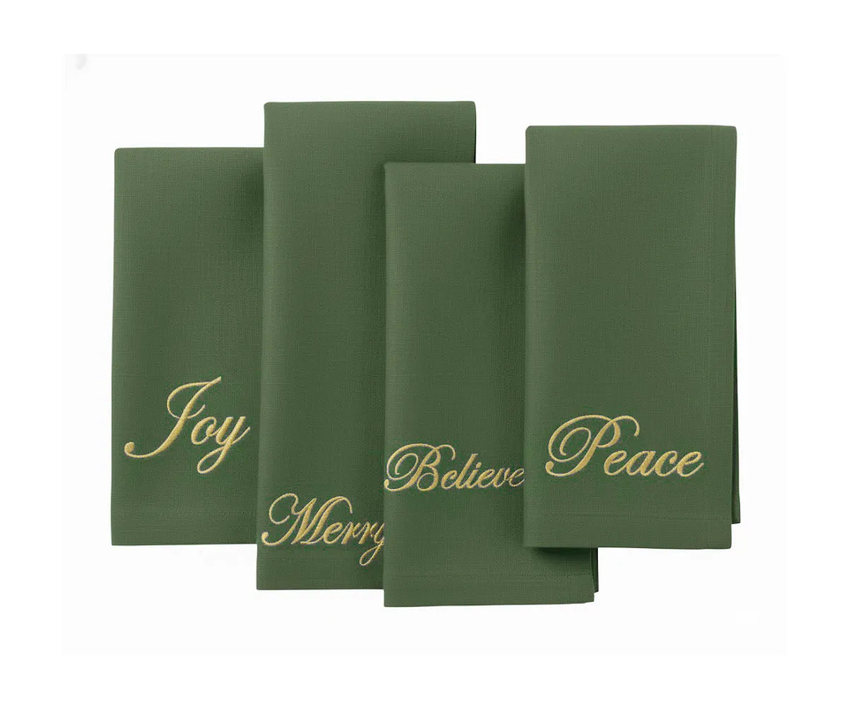 Light green embroidered cotton napkins with festive words, adding a fresh and elegant touch to holiday tables and seasonal celebrations