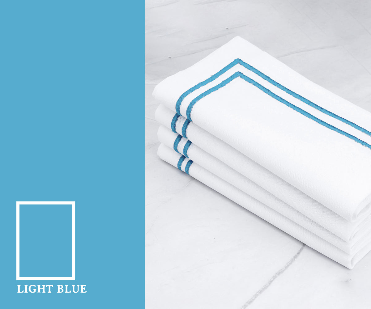 Soft light blue color napkins featuring a cool and airy shade that brings a refreshing and serene look to dining table settings.