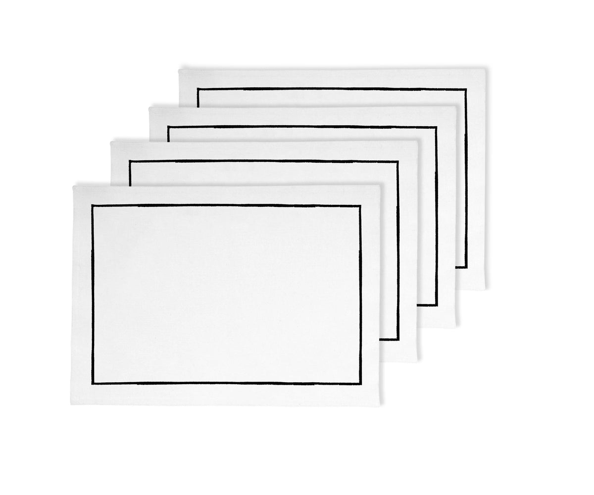 Black cotton placemats with white embroidered edges, 13x18 inches, set of 8.
