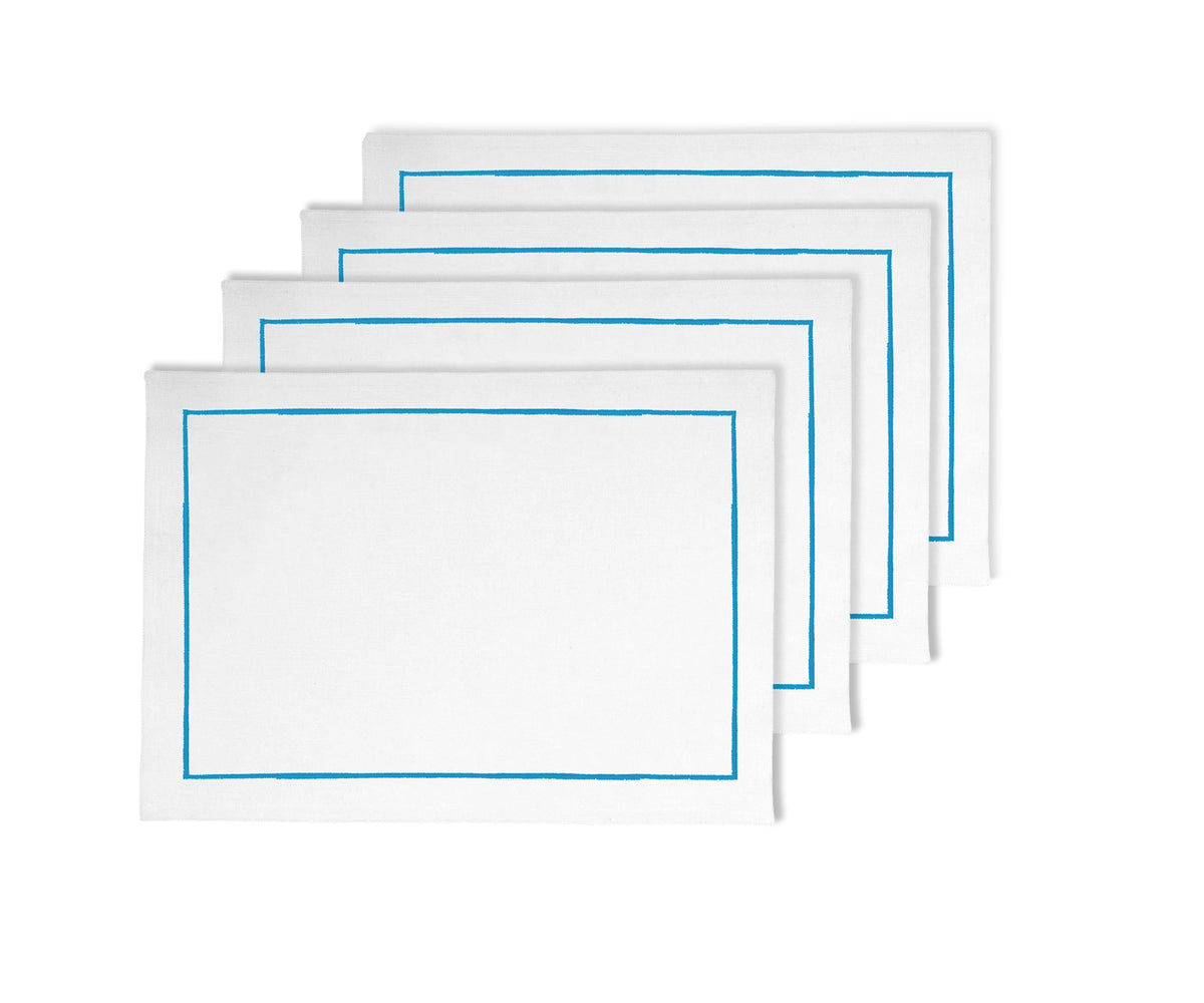 Light blue cotton placemats with subtle line embroidery, 13x18 inches, available in sets of 4 and 8.