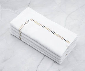 Cotton napkins, information on dinner napkin size, cotton dinner napkins, wedding dinner napkins, and various dinner napkin folds are all aspects to consider.