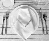 White dinner napkins for a formal and refined table setting