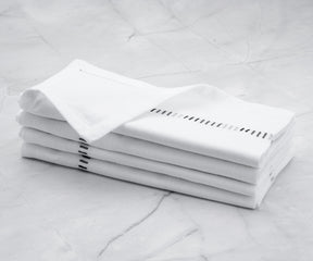 Large quantities of dinner napkins for event catering.