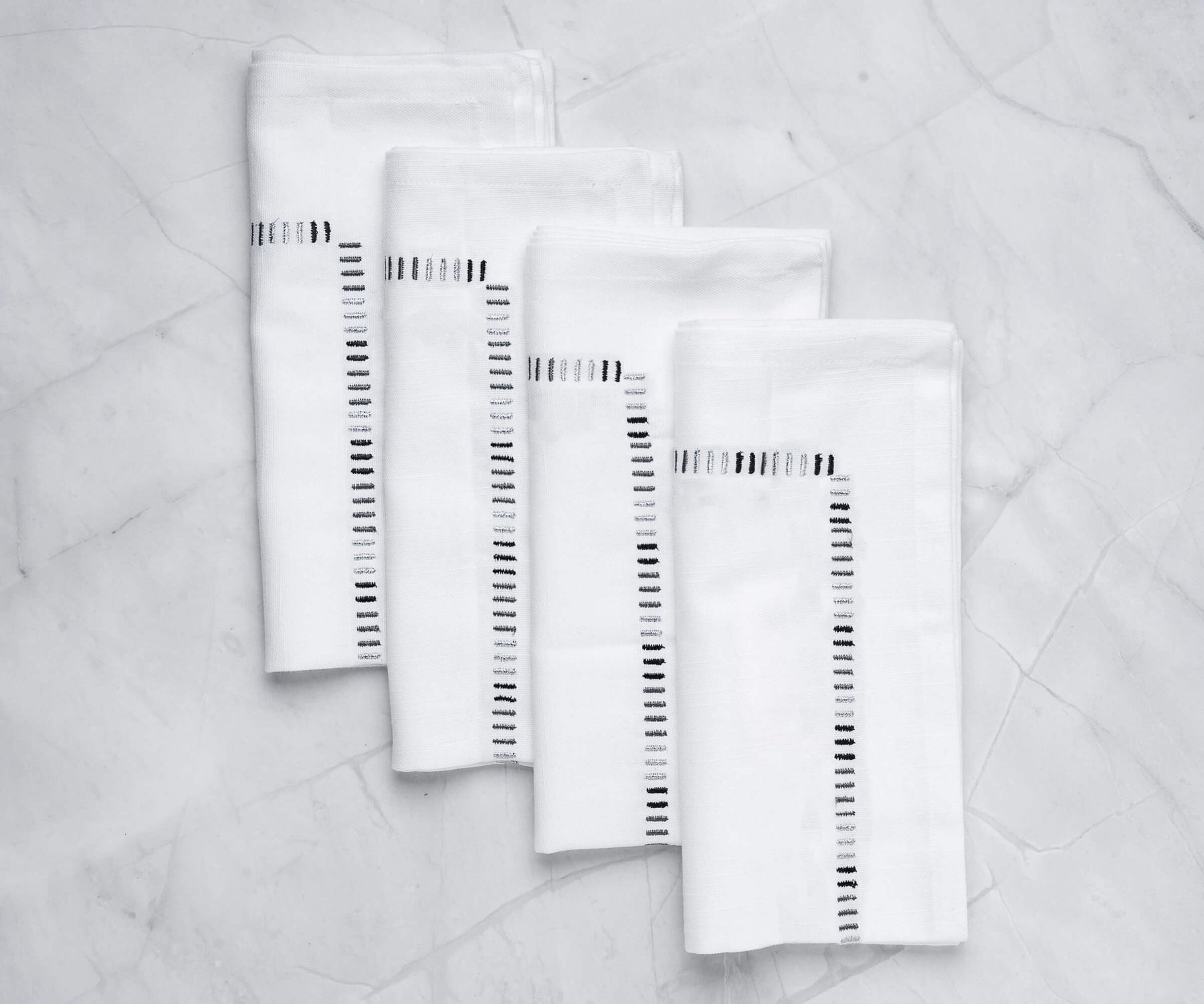 Cloth dinner napkins, instructions on folding a dinner napkin, cotton dinner napkins, white dinner napkins, and black dinner napkins are all available options.