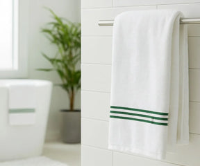Luxury green and white striped bath towel made from 100% pure cotton, featuring soft, absorbent fabric with elegant green embroidery — ideal for home, spa, or gym use.