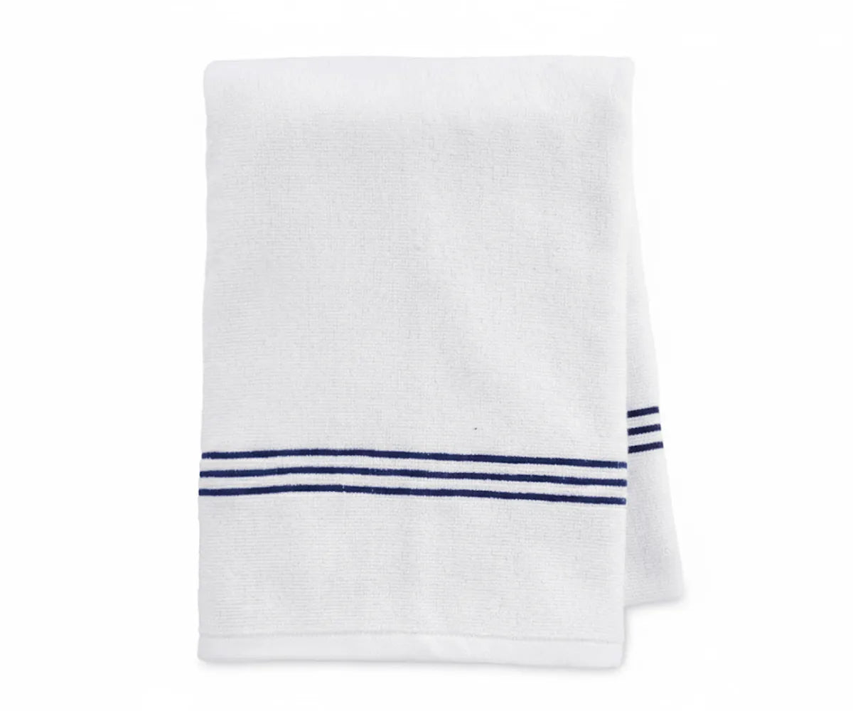 High-quality white bath towel with navy stripe detailing, crafted from durable and absorbent 100% cotton for lasting softness and superior comfort.