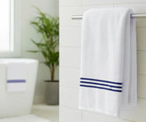 Luxury navy blue and white striped bath towel made from 100% premium cotton, featuring elegant navy embroidery for a soft, absorbent, and spa-quality experience at home.