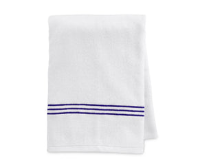 Elegant royal blue and white striped towel with fine embroidery, made from soft and absorbent 100% cotton, machine washable and designed to retain color and texture.
