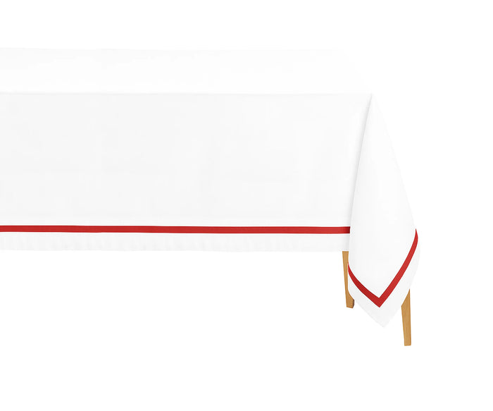 Red satin border rectangle cotton tablecloth on a dining table with white dinnerware