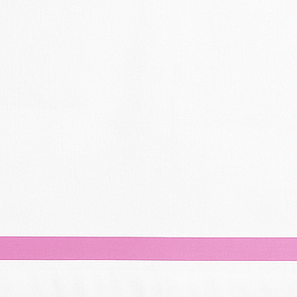Close-up detail of white cotton pillowcase with a pink border line.