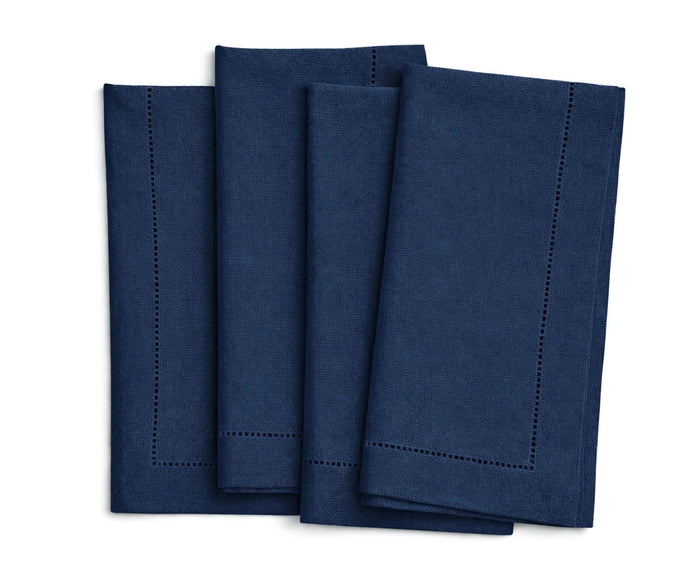 Dark blue linen napkins with hemstitched border for a wedding.