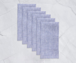 linen cloth napkins set of 6 white and blue striped napkins in a table 