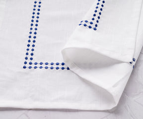 Elevate your dining experience with the timeless charm of Linen Napkins.