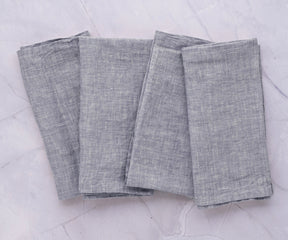 Elegant gray cloth napkins, adding a subtle and sophisticated touch to your dining decor.