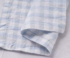 Checkered napkins, with their charming patterns, bring a rustic and cozy farmhouse vibe to your table.