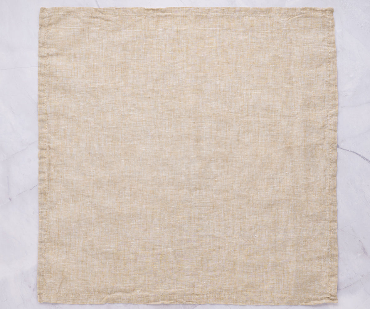 Beige napkins, neutral and elegant, adding warmth and sophistication to your dining setting.