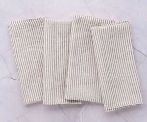 Reusable linen napkins stacked showing eco-friendly, sustainable alternative to paper