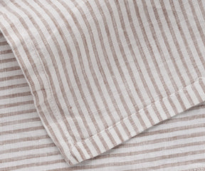 Elegant 20x20 inch striped linen napkin styled for a formal dinner setting