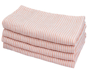 A neatly stacked set of pink and white linen striped napkins