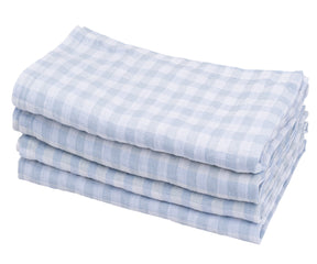 Pile of blue and white gingham linen napkins