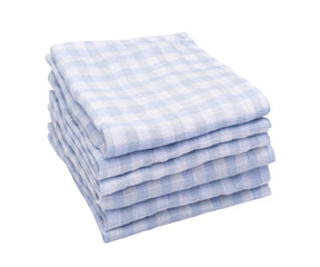 Stack of linen cloth napkins in blue and white checkered design