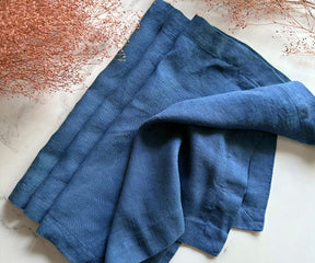 Set of four blue linen napkins
