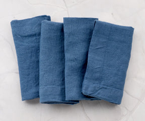 Table setting with blue napkins