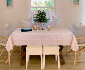 Orange & White stripe tablecloth bringing a fresh and modern touch to your table setting.