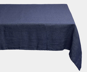 A rectangular tablecloth in classic linen material. Elegant blue tablecloth for a vibrant table setting.