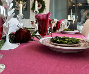 Fuchsia tablecloth offering a neutral backdrop for any table decor.