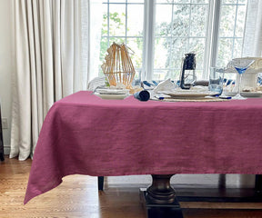 A rectangular tablecloth in classic linen material. Elegant blue tablecloth for a vibrant table setting.