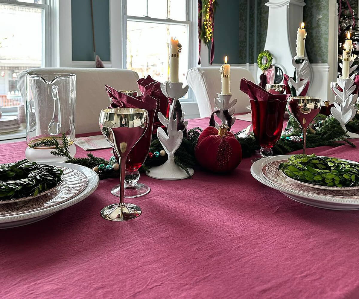 Pink linen rectangle tablecloth adding a touch of elegance to your table setting.