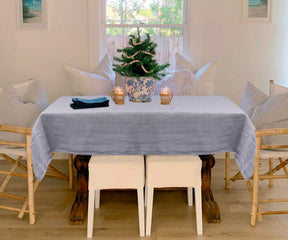 Grey linen tablecloth providing a subtle and versatile accent to your table.