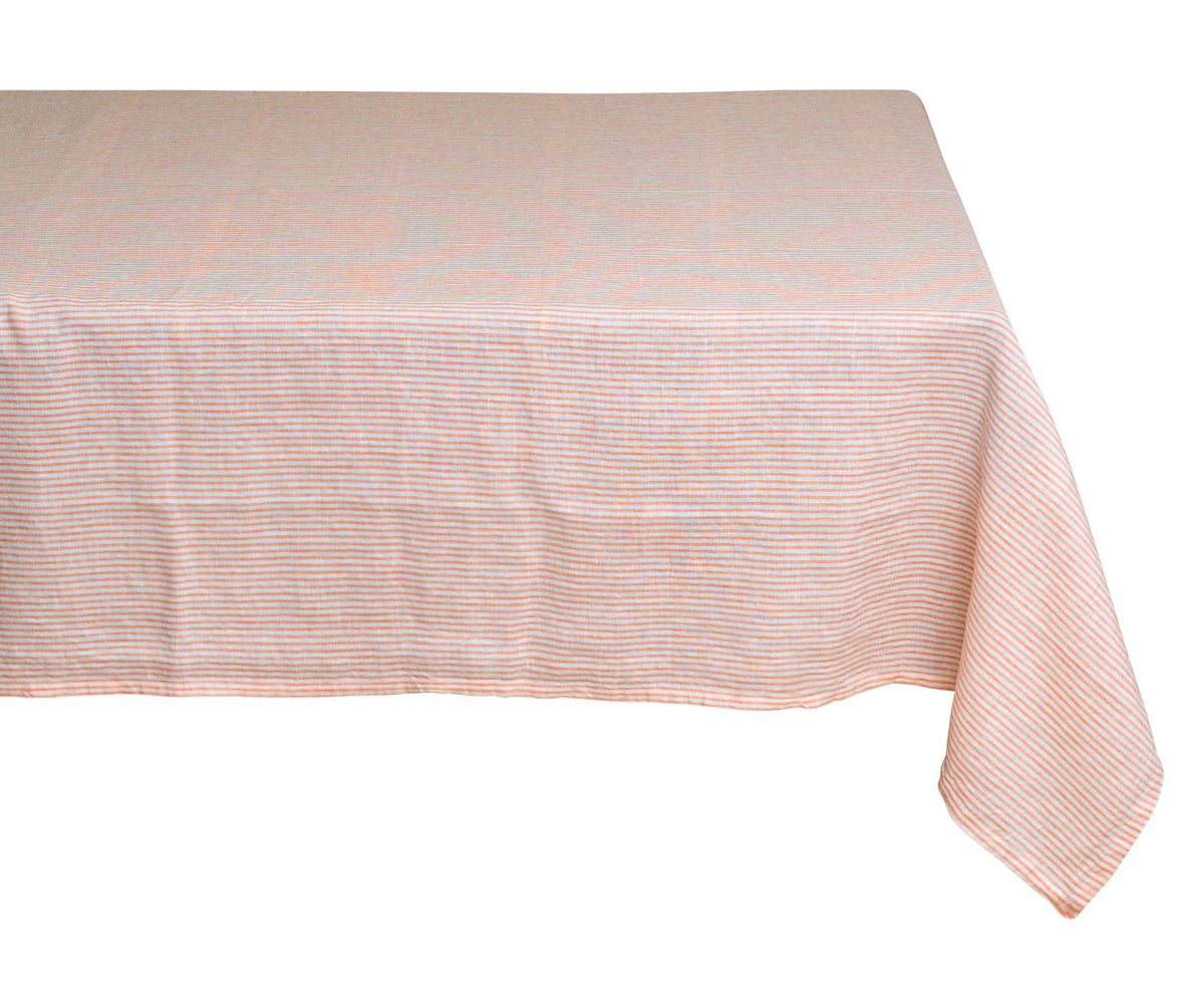"A luxurious linen tablecloth draping elegantly over a dining table.