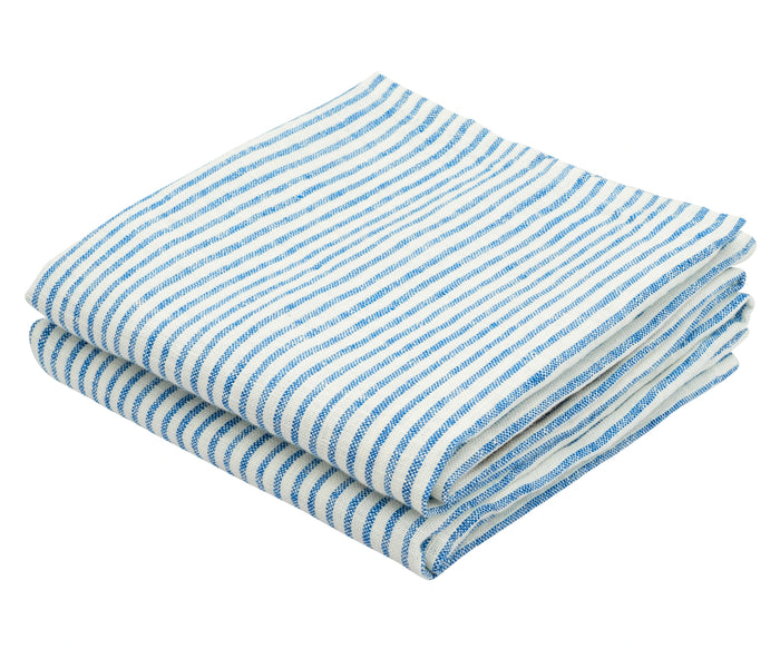Close-up of 100% linen kitchen towel with classic blue stripe pattern