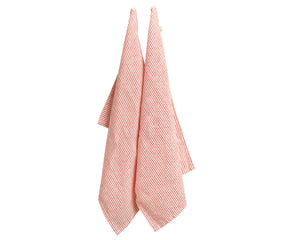 Set of 6 red striped linen tea towels folded on a kitchen counter