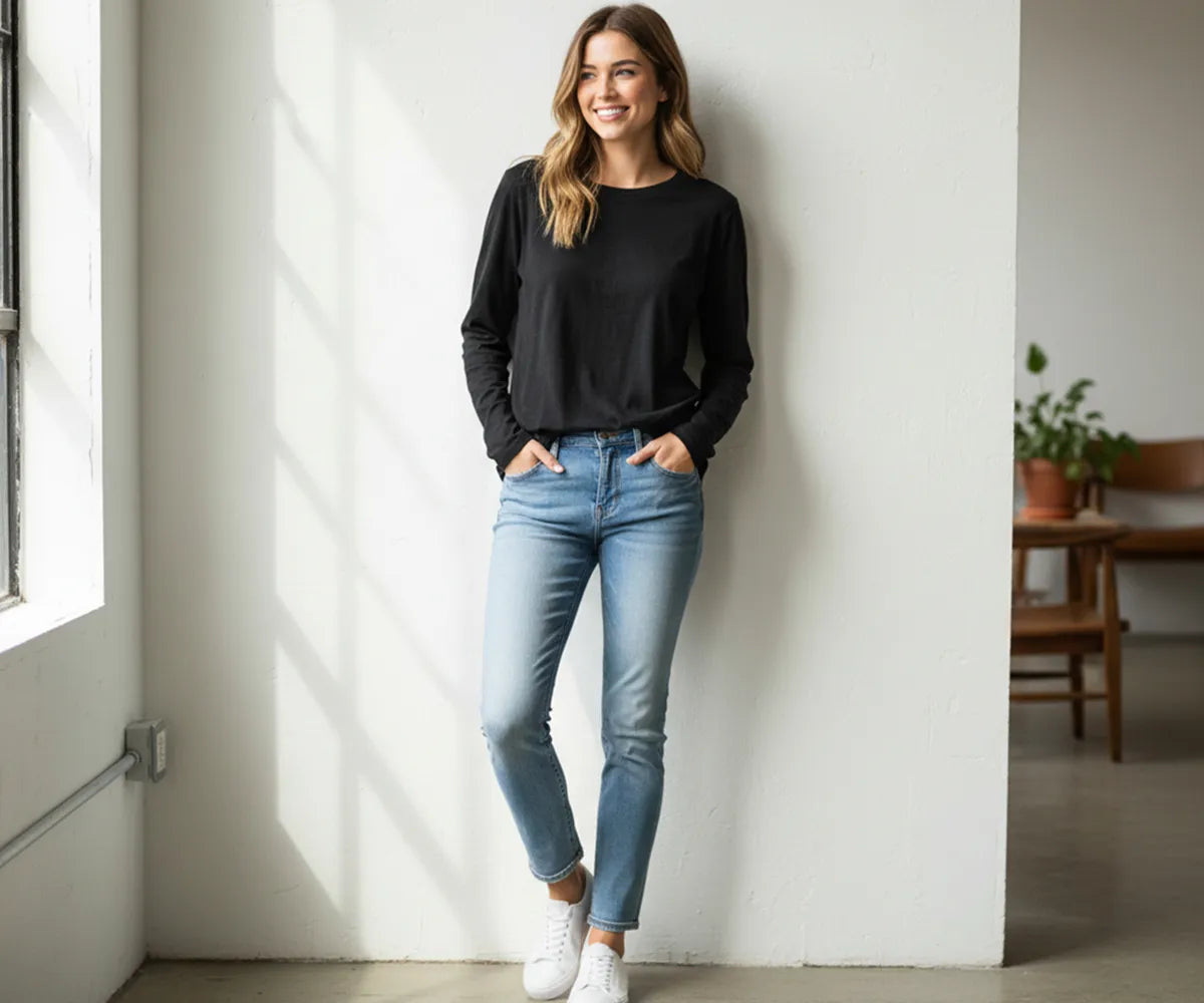 Women’s black long sleeve t-shirt made from 100% organic cotton – breathable, eco-friendly, and sustainably dyed for everyday wear.