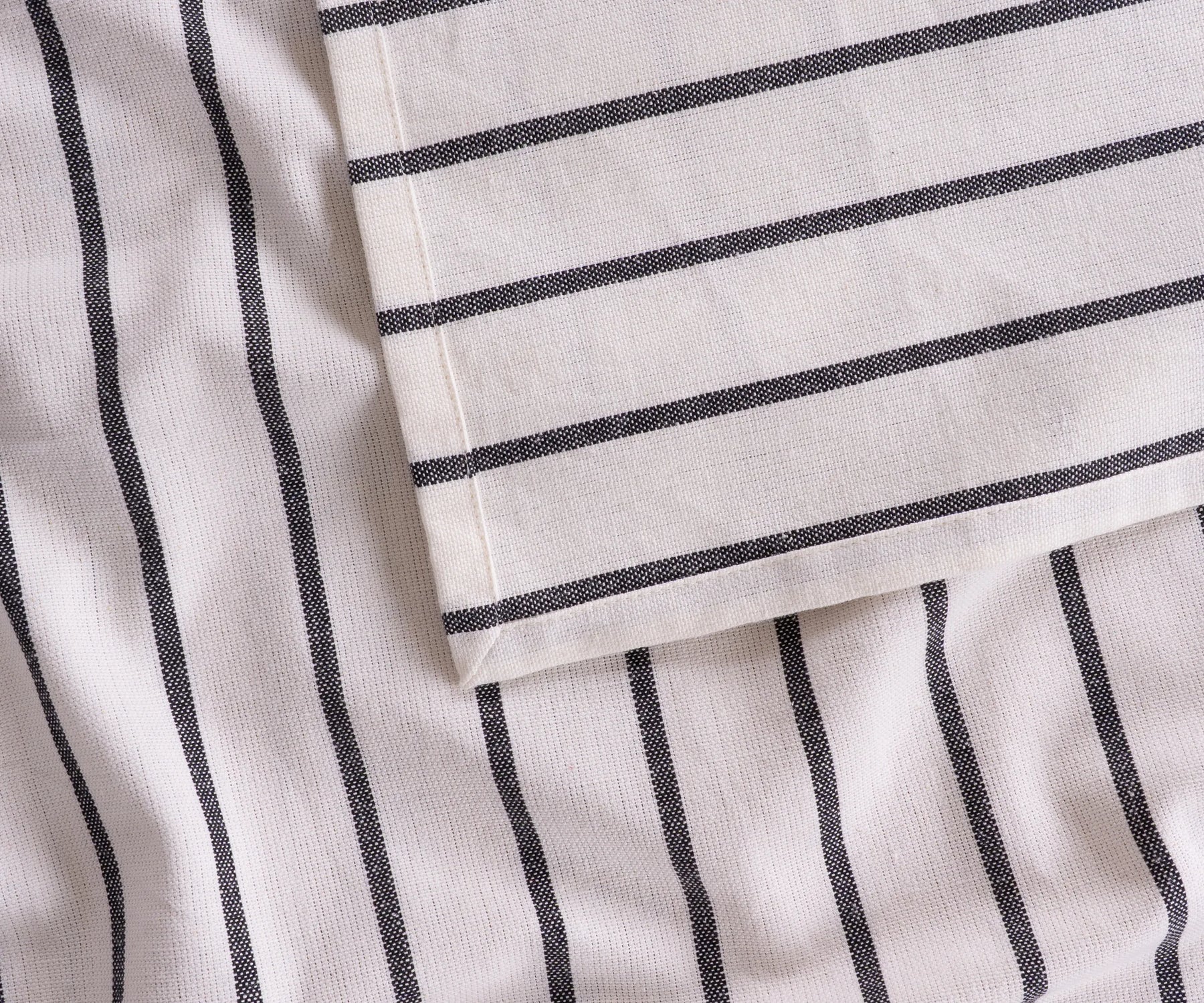 Striped black and white rectangular cotton tablecloth for large tables, elegant and practical table cover for events.