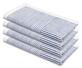 Napkin set with line print pattern displayed on a festive dining table	