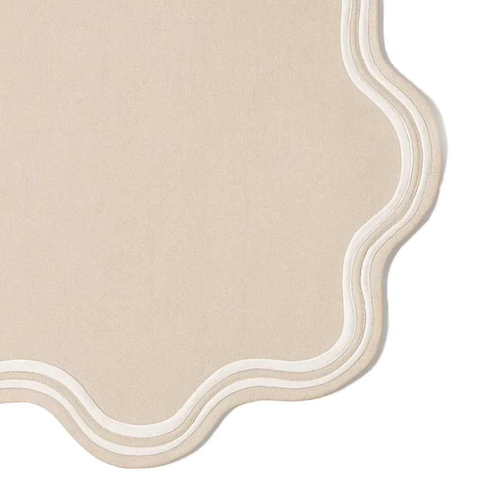 Beige scalloped edge round placemats, 100% cotton – machine washable table mats available in set bulk for elegant dining décor.