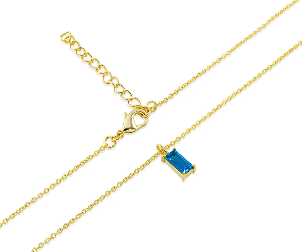 Adjustable gold chain necklace with rectangular aquamarine gemstone pendant