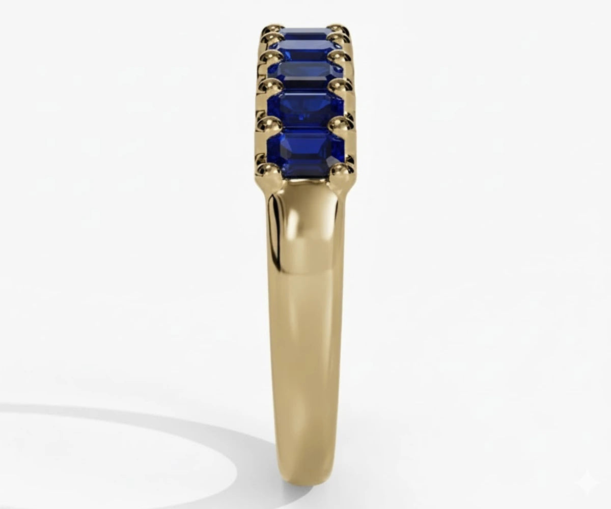 Modern blue sapphire baguette cut ring with slim gold band