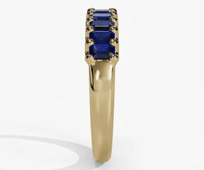 Modern blue sapphire baguette cut ring with slim gold band