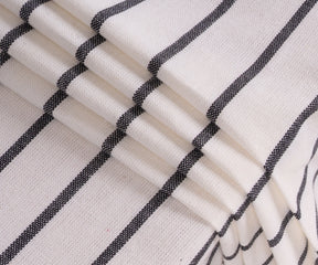 Durable 100% cotton rectangle tablecloth with black and white stripes, perfect for family dinners and formal gatherings.