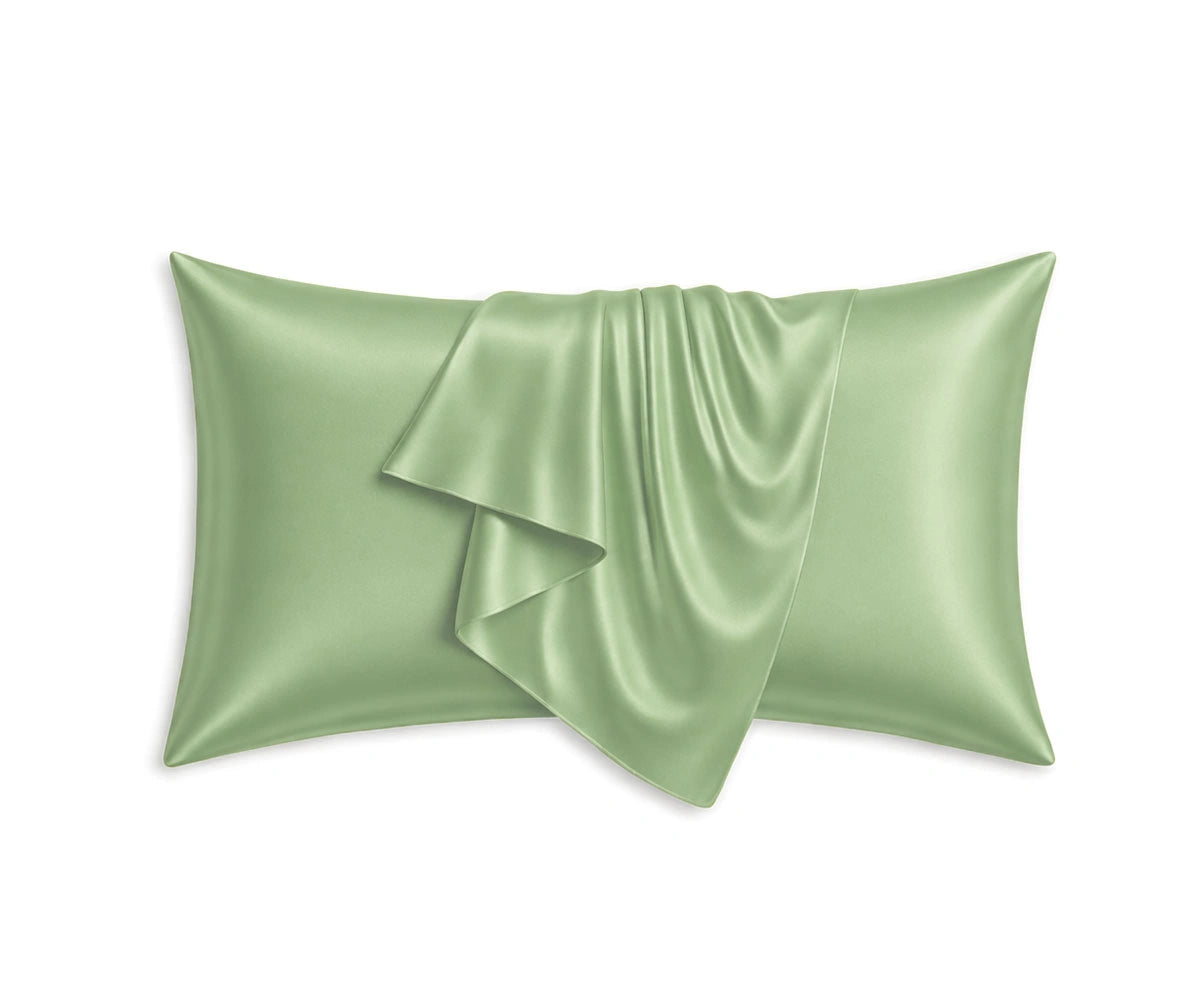 Matcha green mulberry silk pillowcases with a calming pastel hue, featuring a smooth satin-like texture and premium silk quality.