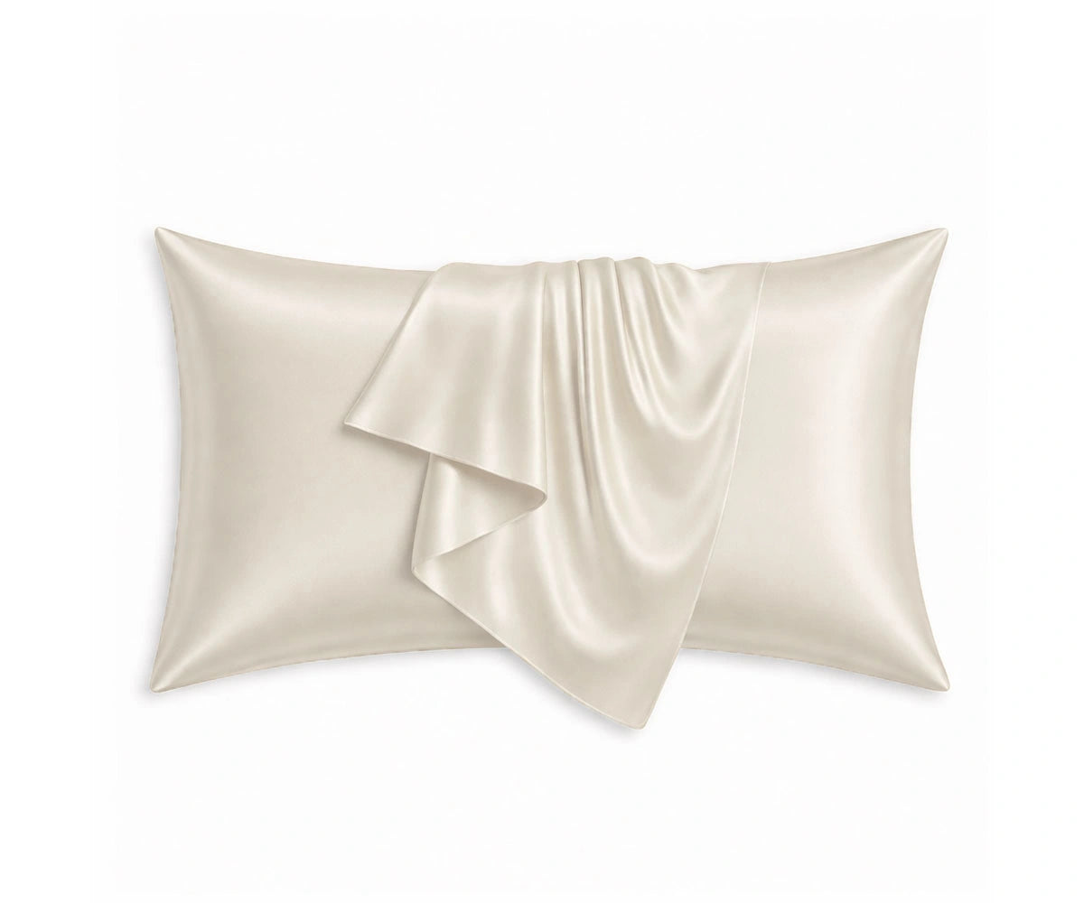 Natural mulberry silk pillowcases in a soft neutral shade, crafted from pure silk with a smooth finish for elegant, hotel-style bedding.