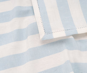 Luxury cotton pale blue napkins with cabana stripe, perfect for entertaining guests.

