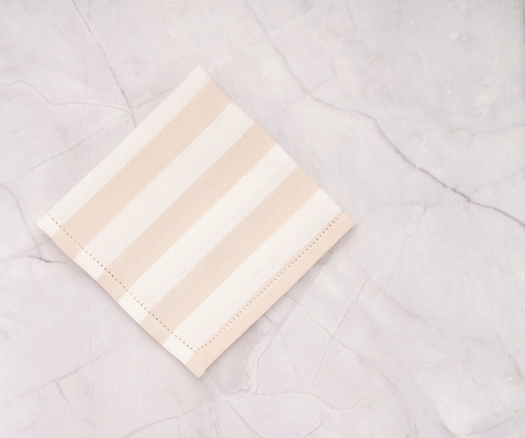 Elegant beige cabana stripe napkins, set of 4, adding charm to any table.
