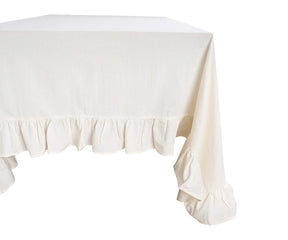 Close-up of soft cotton fabric and ruffle detailing on tablecloth
